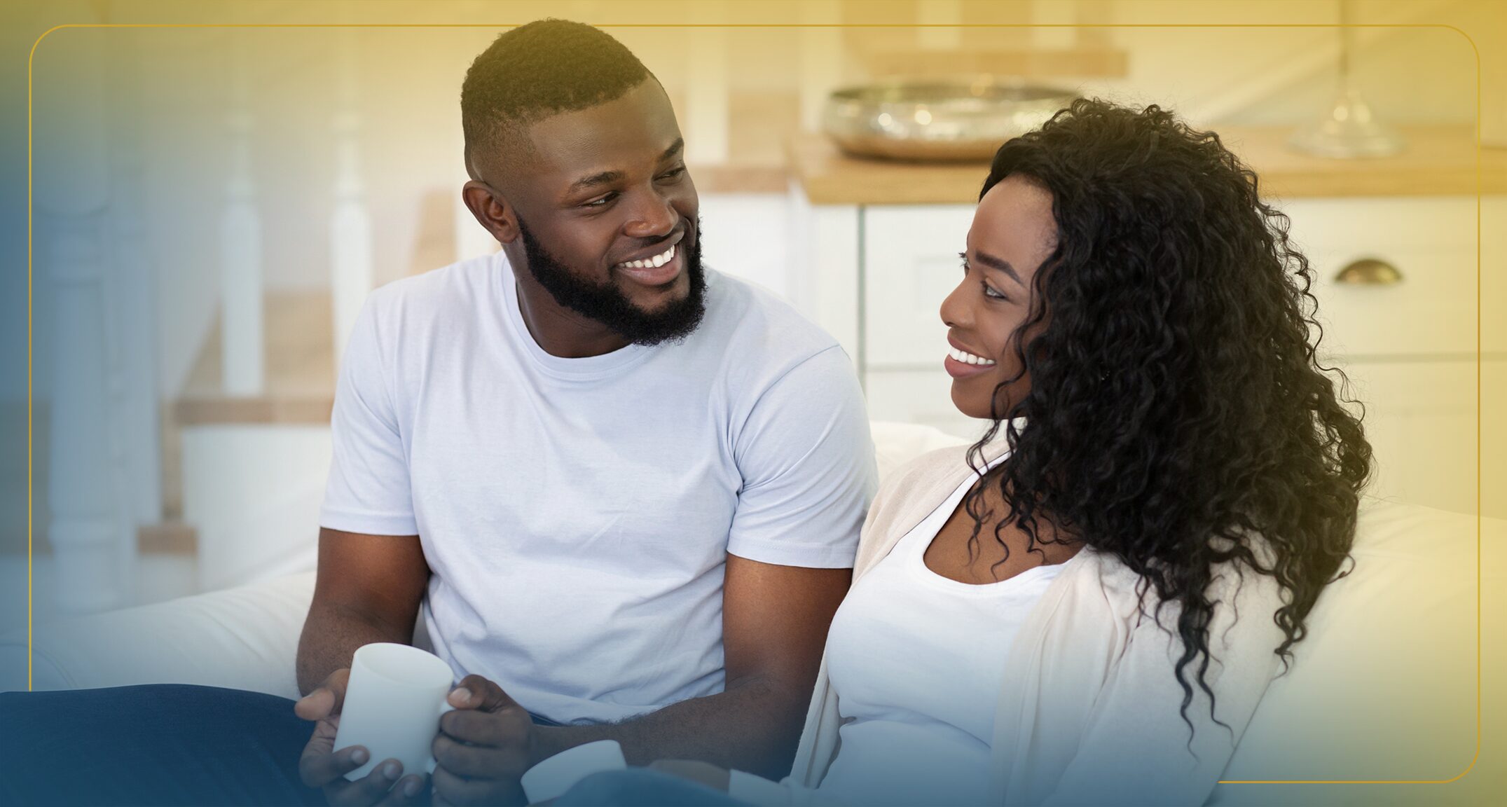Mother and daughter smiling while touching foreheads at the breakfast table.